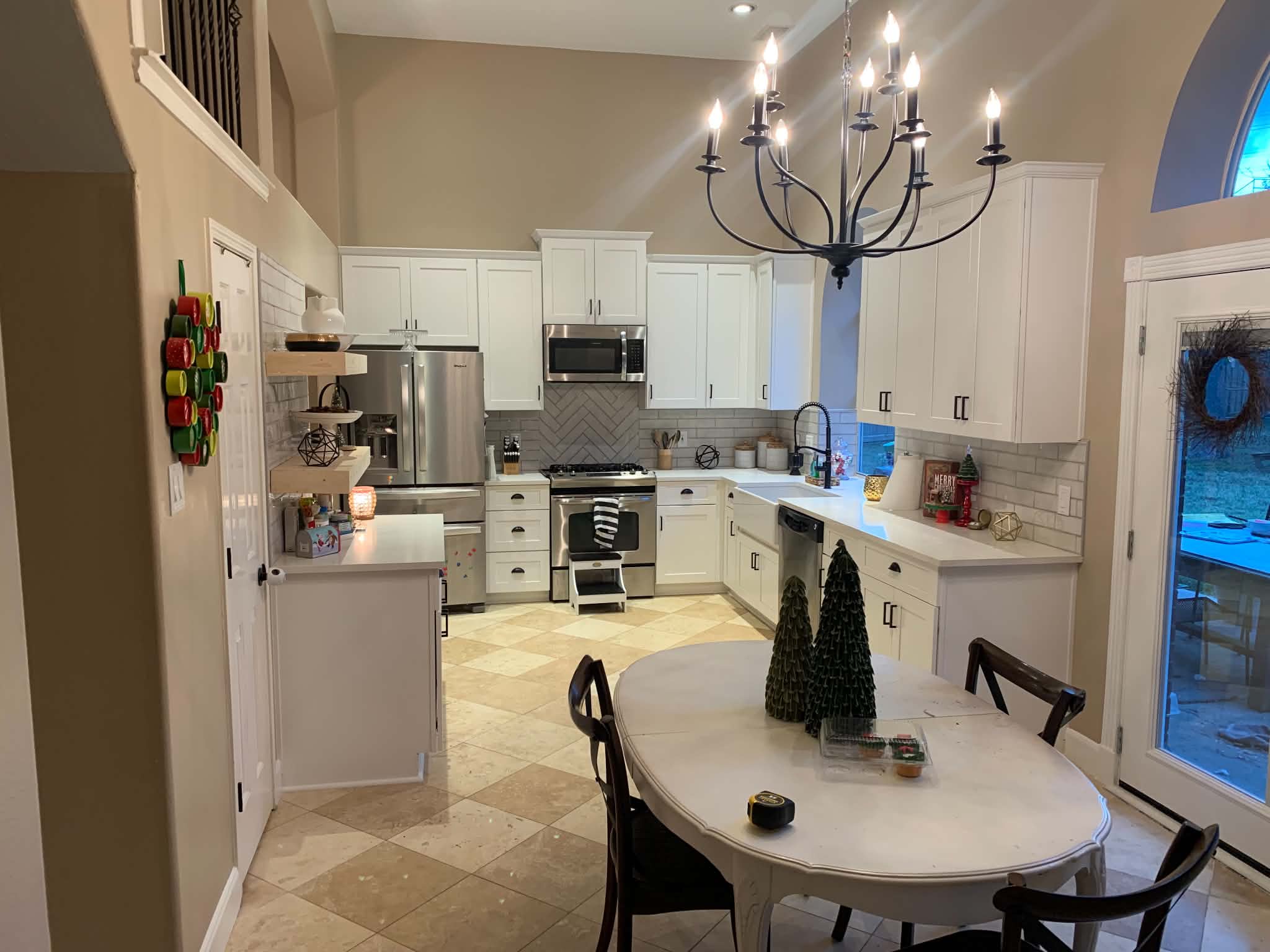 Completed kitchen remodeling project with updated cabinetry and finishes