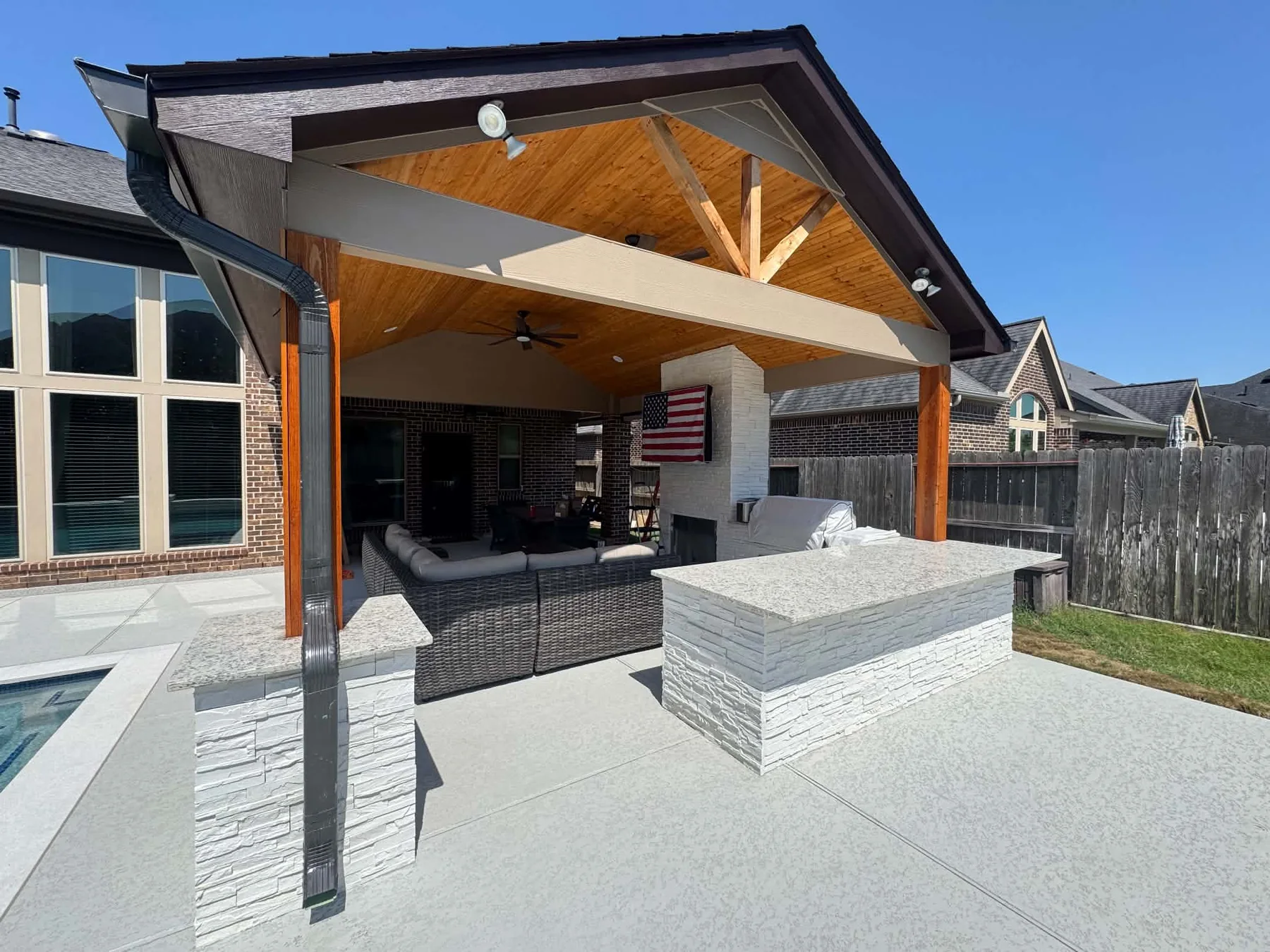 Covered outdoor patio remodeling project by All Phase Remodeling